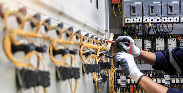 Professional Electrician technician working in Merriam Woods, MO
